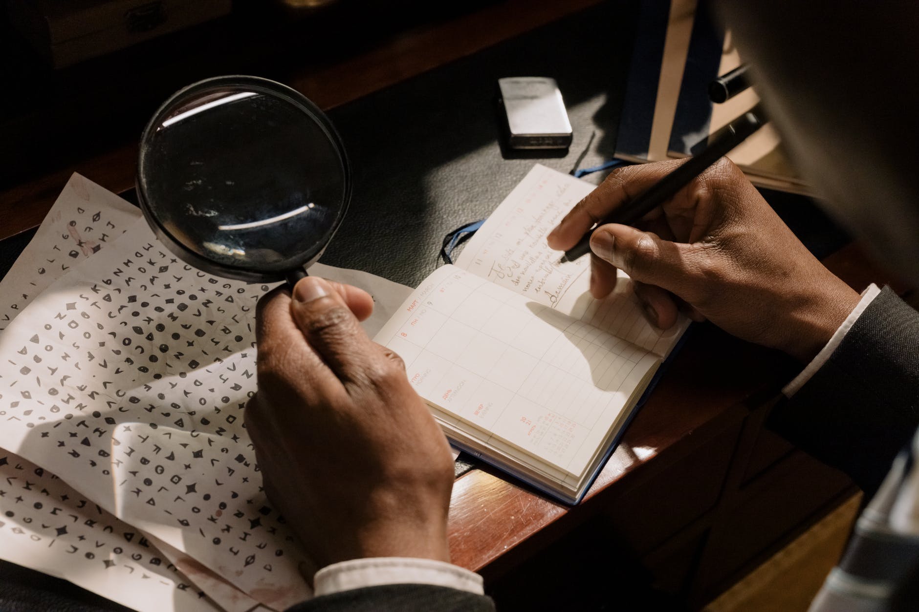 photo of person taking down notes